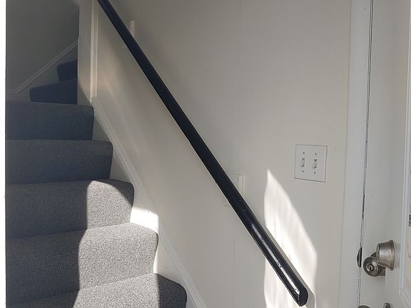 Stairs leading to 2nd floor unit