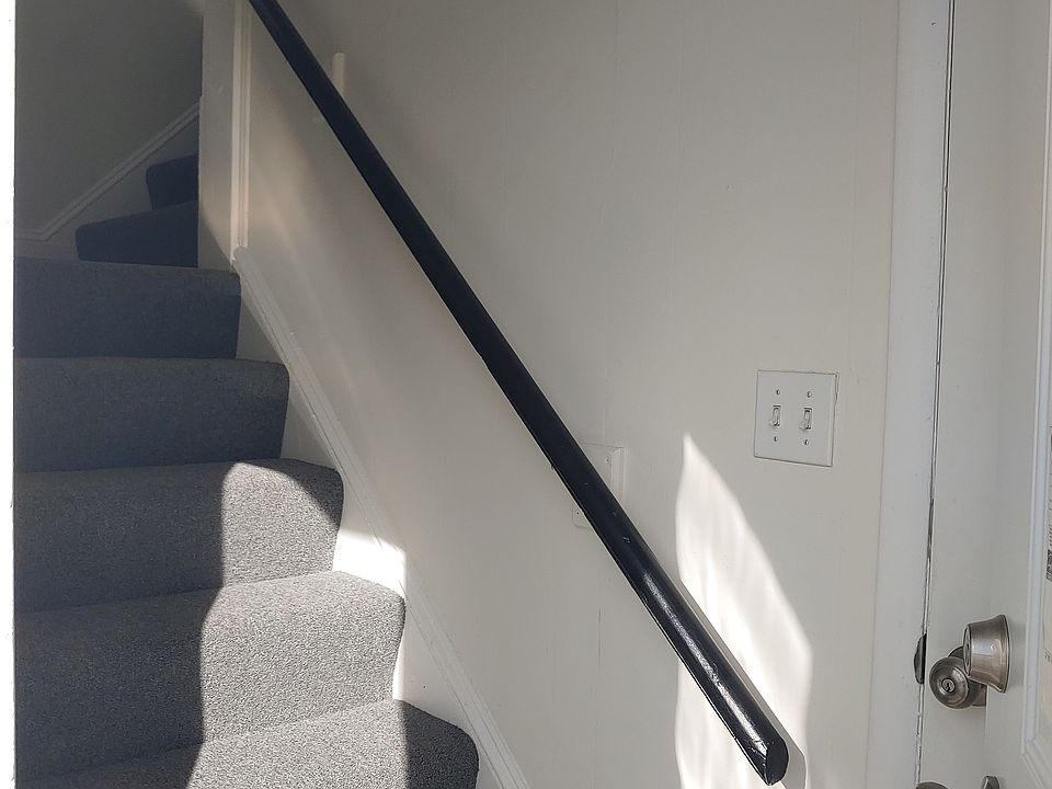Stairs leading to 2nd floor unit