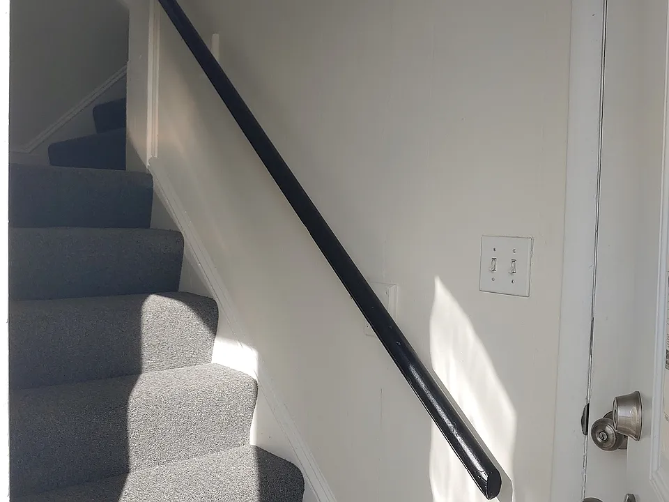 Stairs leading to 2nd floor unit