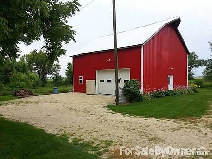 Barn
						:
						Concrete floor, LP and wood heat. 3+ cars. Wet bar and toilet. Floor drain.