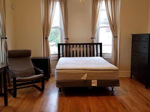 BR Area; Hardwood Flooring Throughout!! Floor to Ceiling Bow Windows