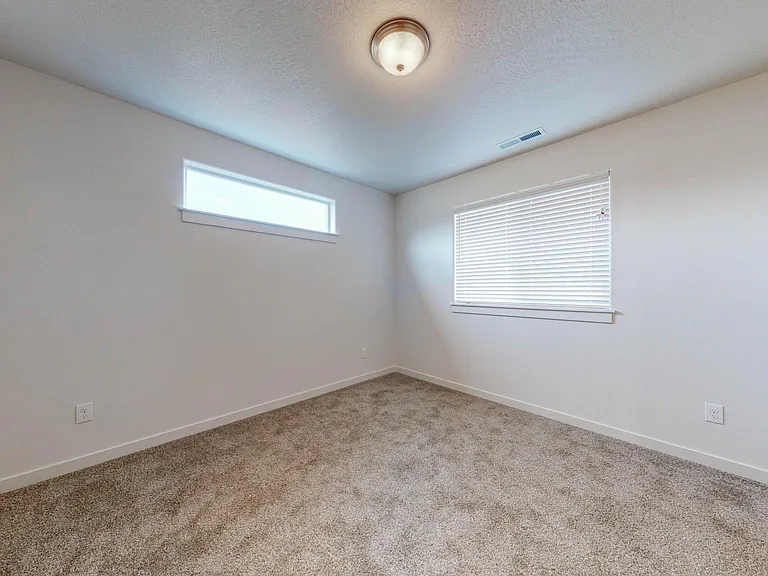 Master bedroom, overlooking large backyard