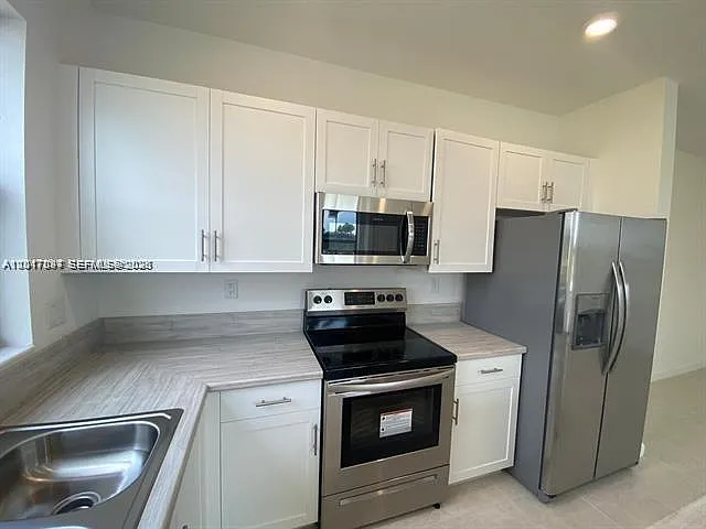 575 NE 208th Ter #575 — Photo 18