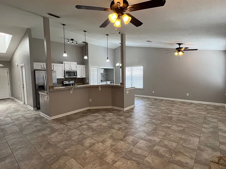 7820 Collins Ridge Blvd E — Photo 3