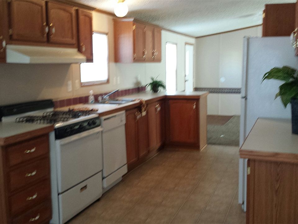 A lot of cabinet space in this beautiful Kitchen