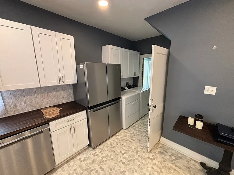 laundry on main floor!
(there are a few renovations still in progress, so the countertop fix, and paint splatters will be fixed soon)