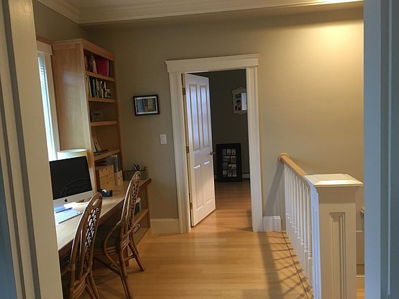 upstairs landing between the two similarly sized bedrooms.