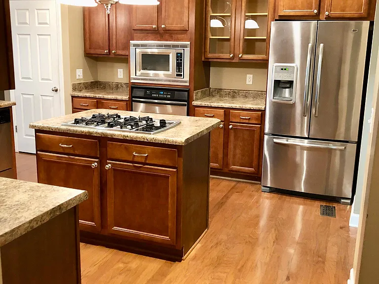 Kitchen with stainless steel appliances.