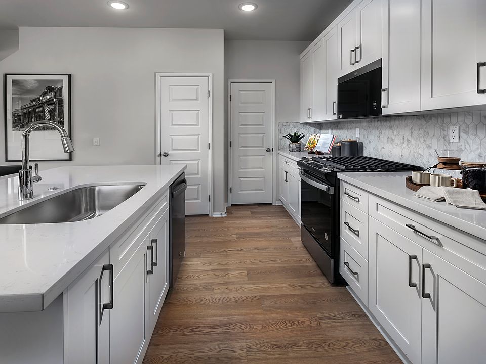 Kitchen in the 3218 floorplan at a Meritage Homes community in Temecula, CA.