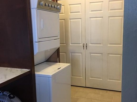 Washer dryer, storage closet