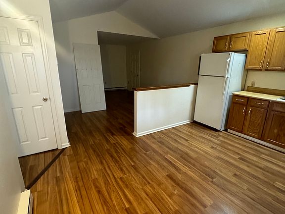Kitchen looking into living room