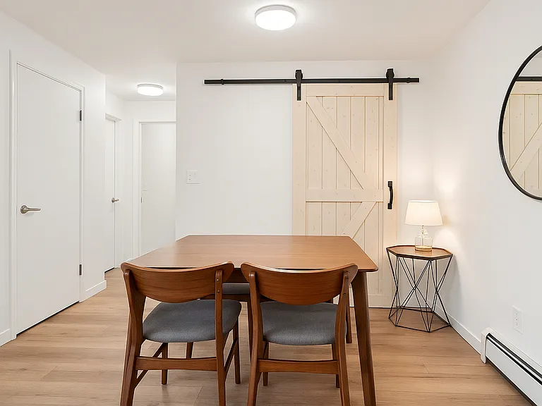 This dining space invites connection _ perfect for a quiet morning coffee or a shared dinner in natural light
