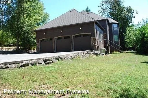12180 NW Sunningdale Dr photo 1