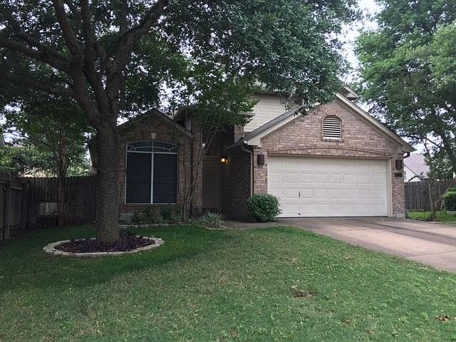 Large trees on a quiet cul de sac lot with 2 car garage