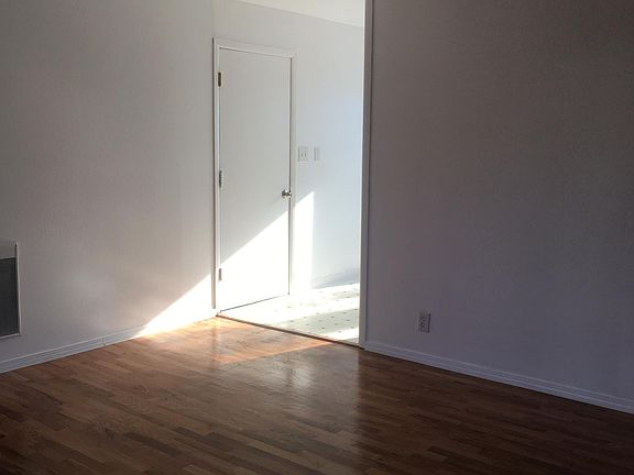 looking from living room into kitchen area