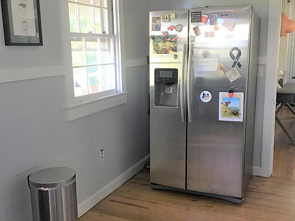 Large stainless steel fridge.