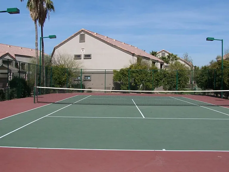 Gated, regulation size, tennis court. Ready for a game?