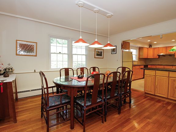 Dining Room adjoins Living Room, Kitchen and Sunro