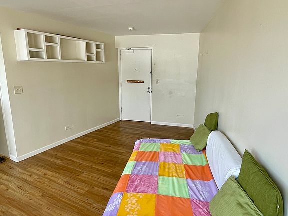 Living Room - view from large glass window facing entry (Bed NOT included in the rental, for size reference, this is a twin sized daybed)