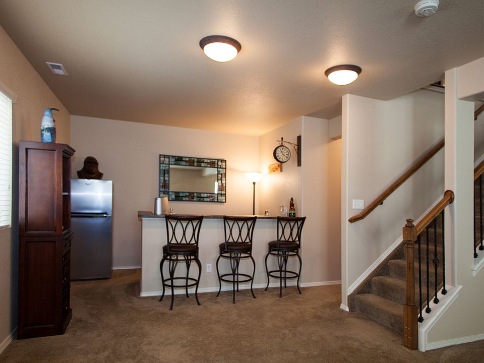 Wet bar has wine refrigerato