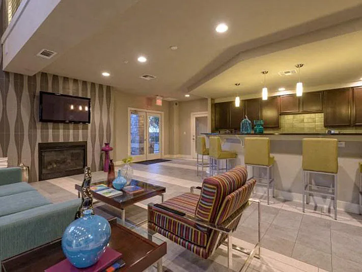 Community Lounge with chef's kitchen and fire place