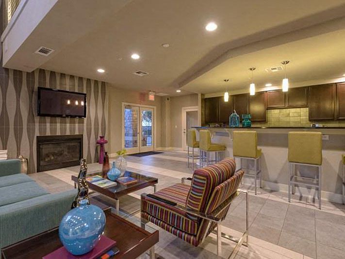 Community Lounge with chef's kitchen and fire place