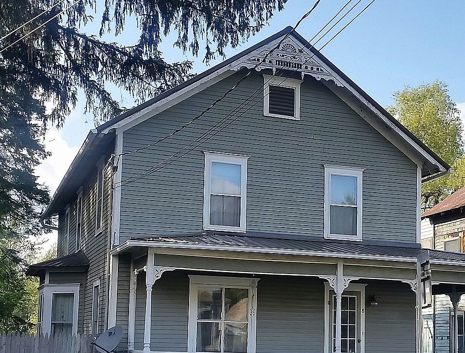 New metal roof and gutters.