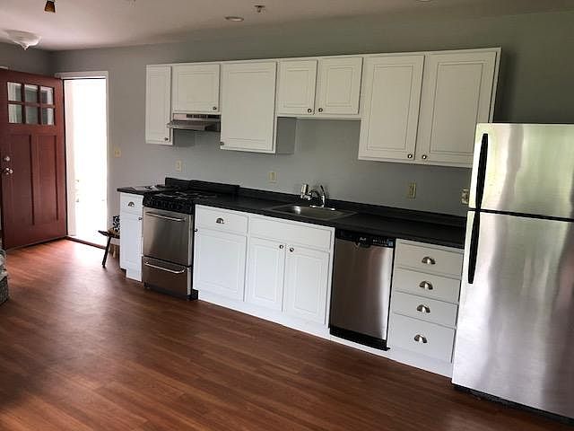 Entrance into Kitchen. Shared kitchen/living area.