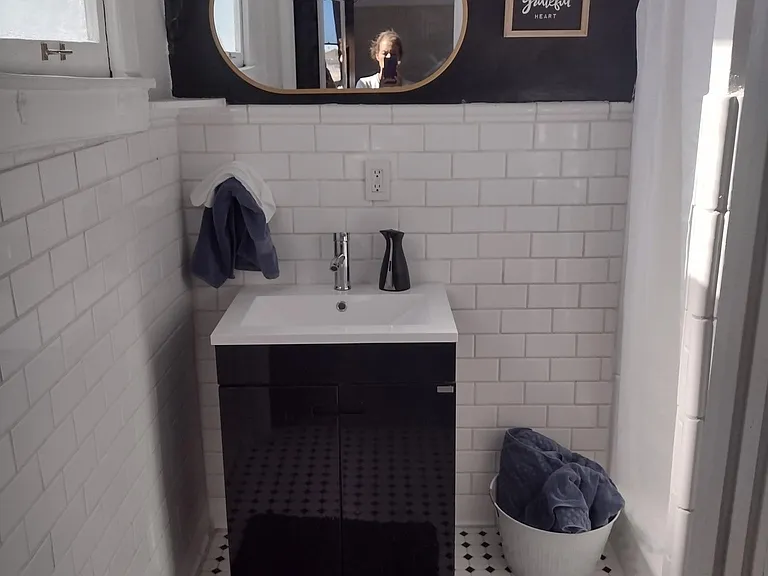 Bathroom with shower and toilet to right side