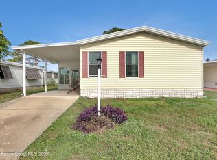 411 Egret Cir, Barefoot Bay, FL 32976