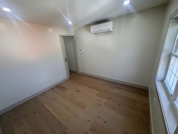 Bedroom #1 with natural light and individual heating and cooling.