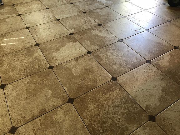 Ceramic Tile Flooring in Kitchen, Dining, and Downstairs Hal