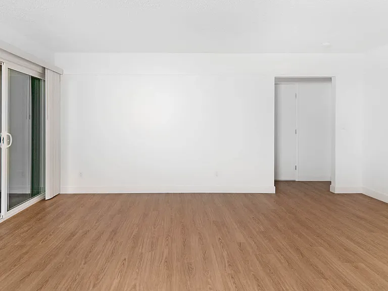 Living Room with Patio and Hard Surface Flooring