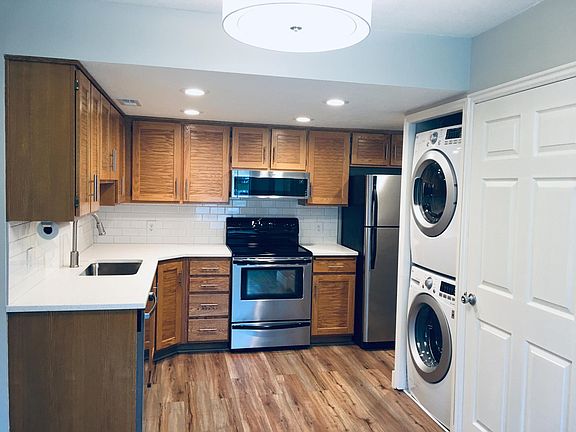 New flooring, new washer/dryer, new quartz tops and sink. Large pantry next to washer/dryer.