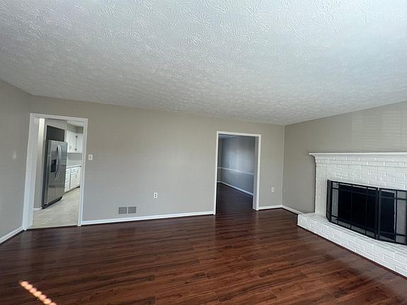 Living room - left is kitchen, right is dining room