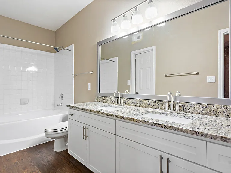 Updated, well lit bathrooms (In some homes).