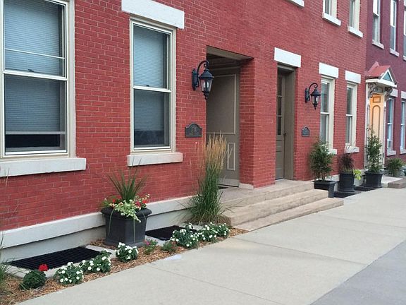 building front with plantings