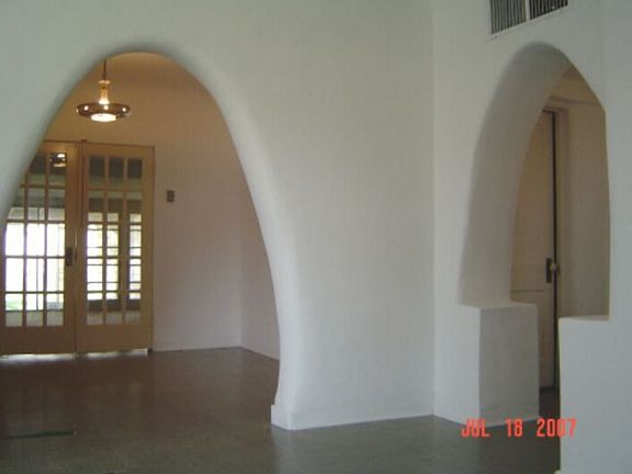 Living room view of dining room, hall
