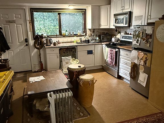 Studio kitchen and private door entrance