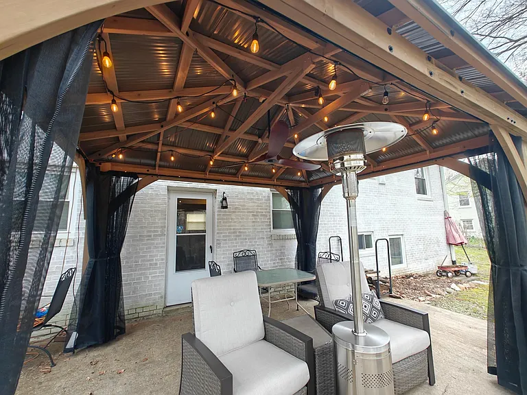 Patio furniture, heat lamp not included.