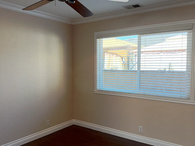 Versatile second bedroom ideal for a guest room, office, or additional living space.