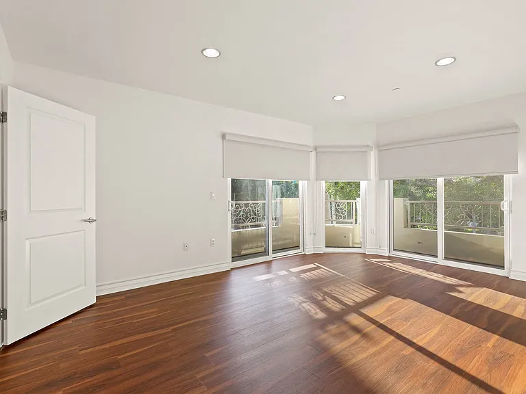 Spacious Size Bedrooms with Hardwood Flooring and Large Windows