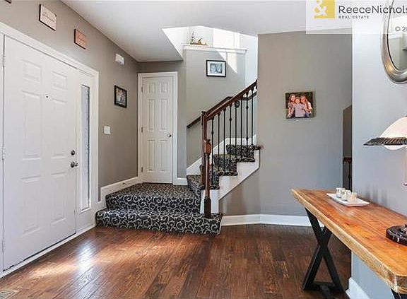 Enter into pristine hardwoods and new stair carpet