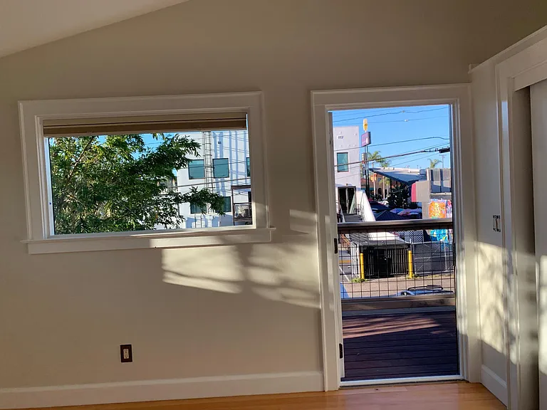 Bedroom 4, view of most popular graffiti mural wall in Hillcrest, and University Ave beyond