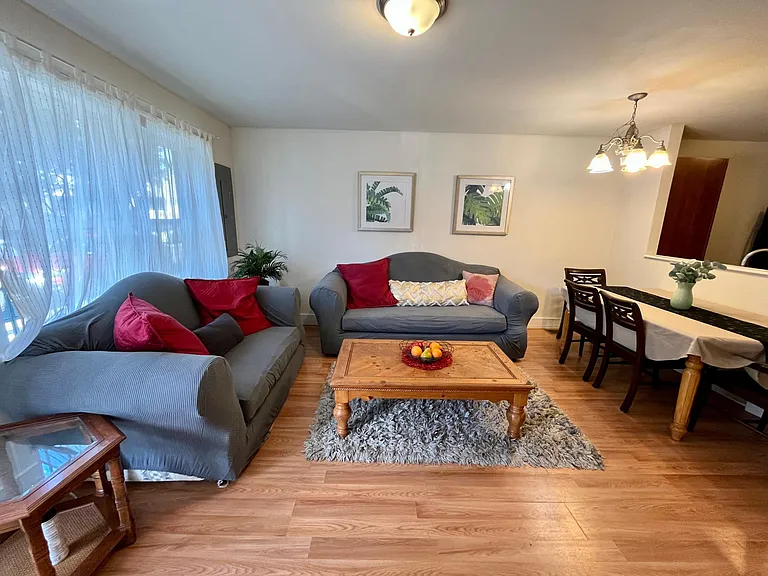 Open living room with dining area.