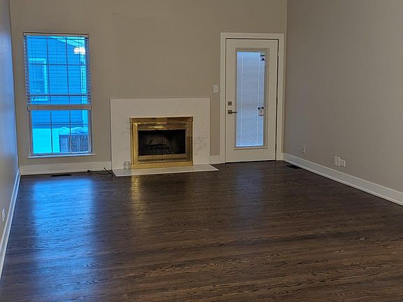Open floor plan living room with vaulted ceilings
