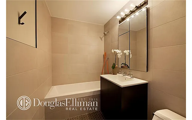 Sold by Douglas Elliman | media 10