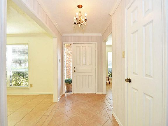 Sunny Foyer with split Formal Living & Formal Dining Rooms
