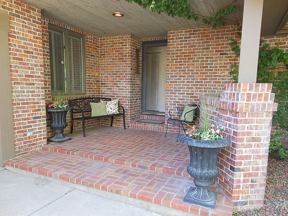 Inviting covered brick entry