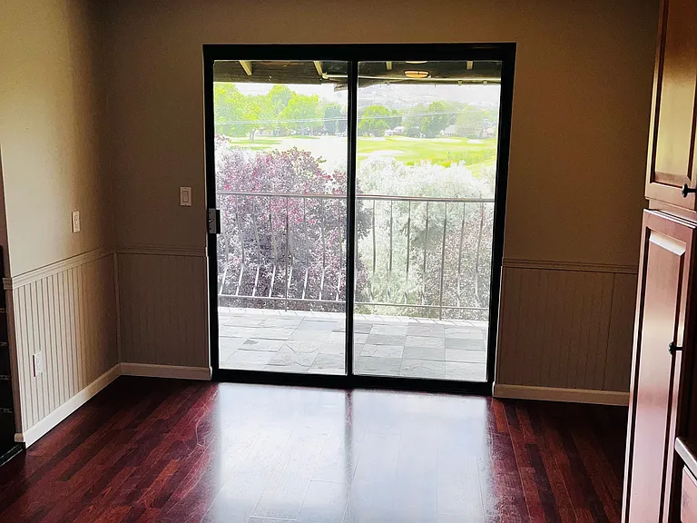 Dining and slider to balcony